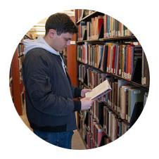 Image of a student in the James A. Cannavino Library.